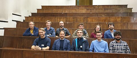 The participants of the project meeting in an old lecture hall at the Röntgen Memorial Site in Würzburg.